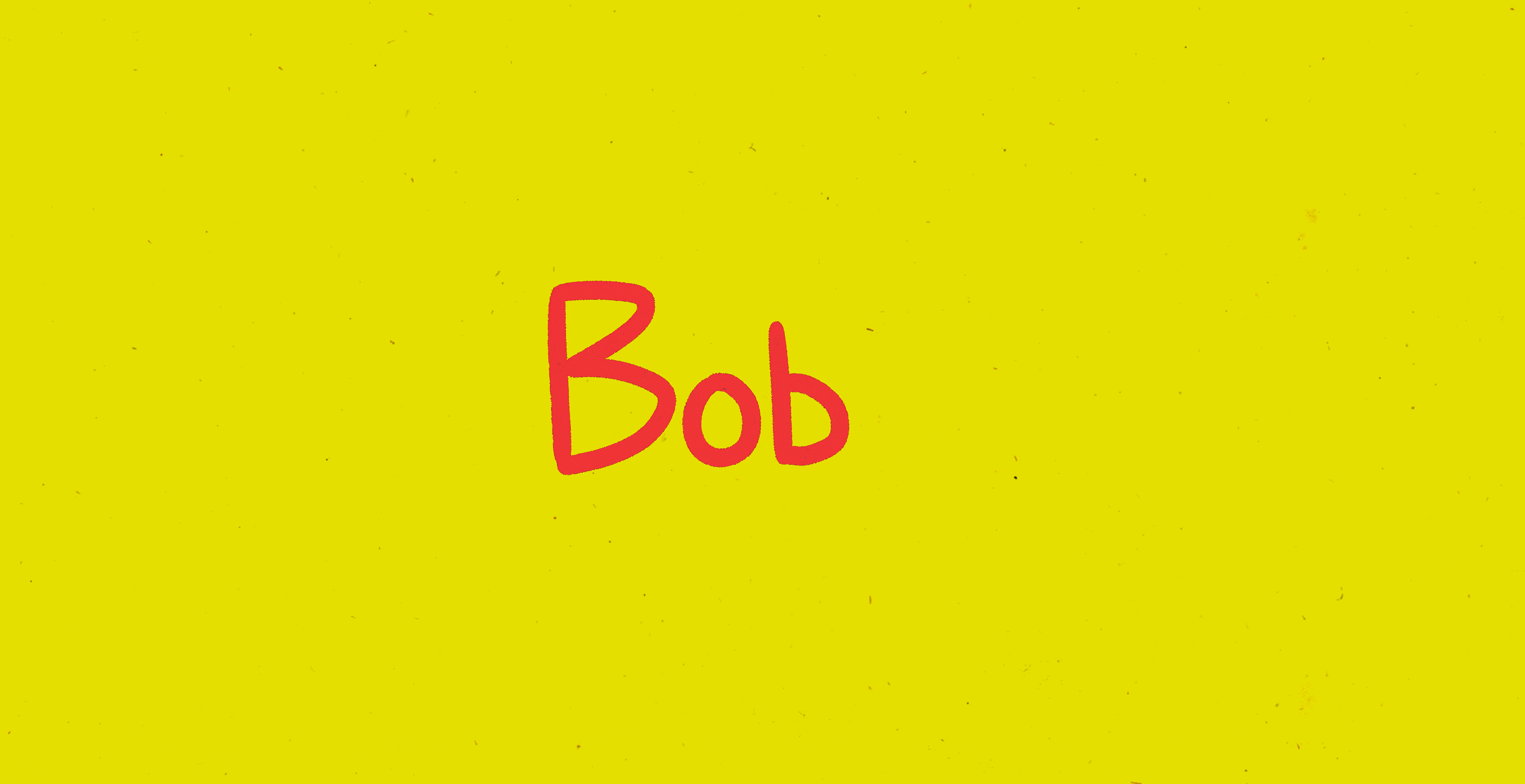 A yellow rectangle with the word "Bob" in red handwriting.